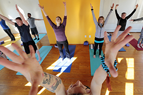 PHOTO PETER PEREIRA/The Standard-Times ++ Yoga instructor Juliet Loranger leads her morning class through various poses at her studio Yoga on Union on Johny Cake Hill. in downtown New Bedford, MA.